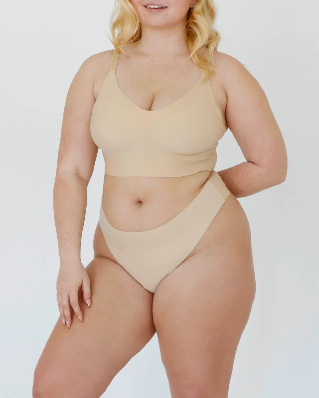 seamless high - cut women thongs for a seamless silhouetteOkko Signature Mid-Rise Thong in Creme seamless high - cut women thongs for a seamless silhouetteOkko Signature Mid-Rise Thong in Creme